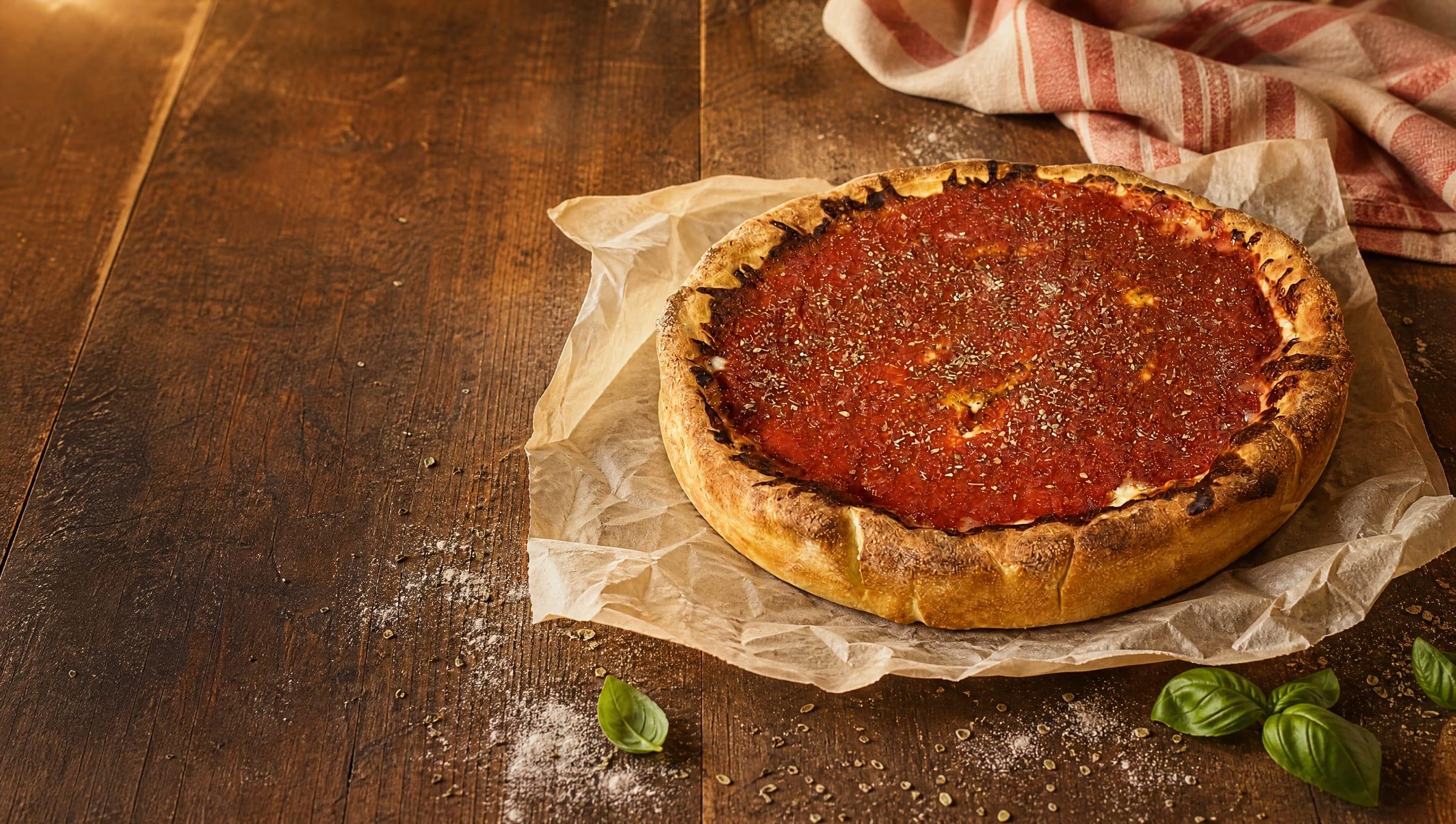 Al's signature deep dish pizza